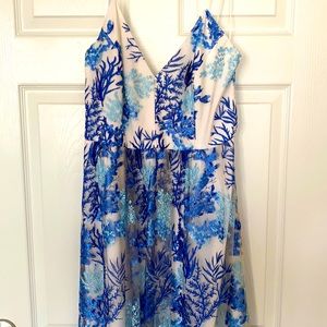 Nicole Miller floor length gown. Blue and teal coral pattern over white.